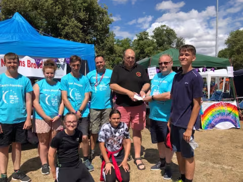Chairman of WRS presenting cheque to first recipients of Keith Bishop Memorial Scholarship in 2018