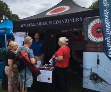 WRS gazebo with volunteers and excited visitors to the stand